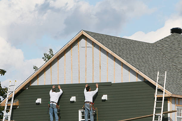 Professional Wood Siding technician working in Stow, MA